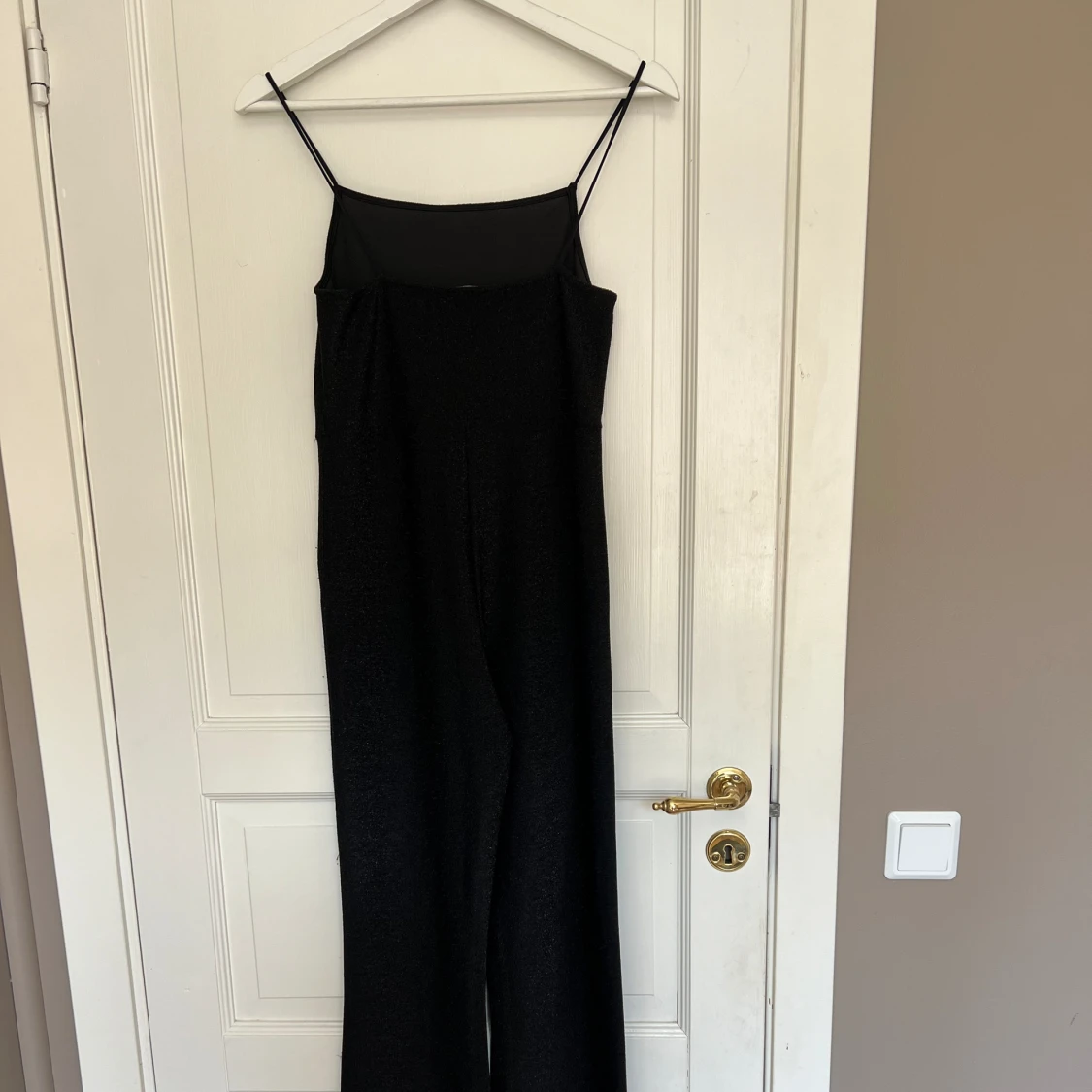 Glittrig byxdress - 91