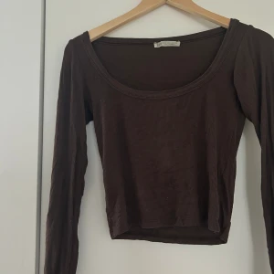 Topp - Brun topp, knappt använd.