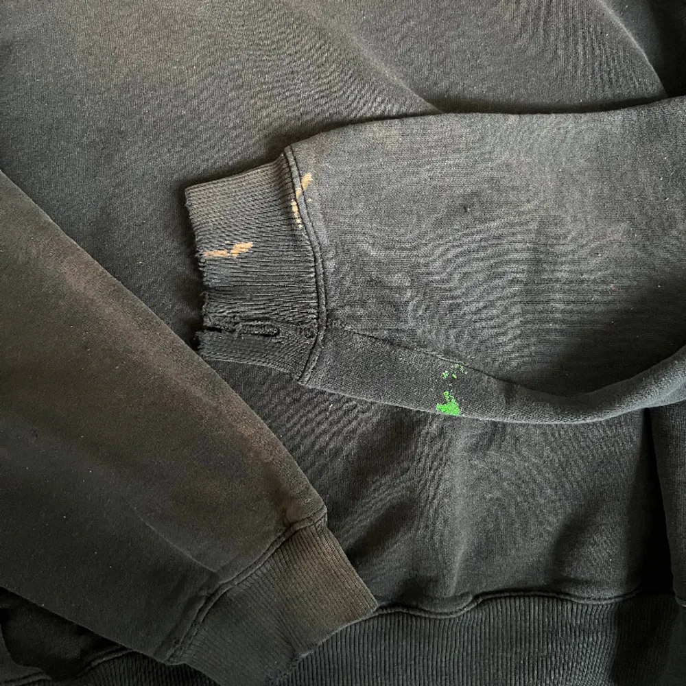 Champion sweatshirt with some stains. As you can see in the picture it’s been bleached. Hoodies.