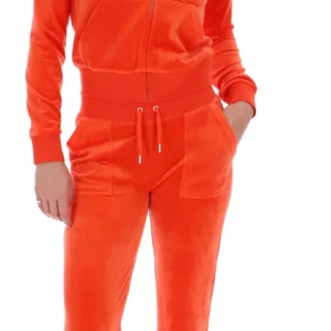 Juicy couture orange - Beige juicy sätt säljer då jag inte har nytta av den eftersom den inte passar längre kan tänka mig gå ner i pris