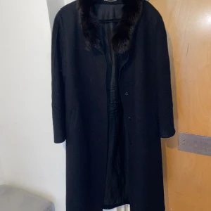 Black Coat - Black coat woth furyy