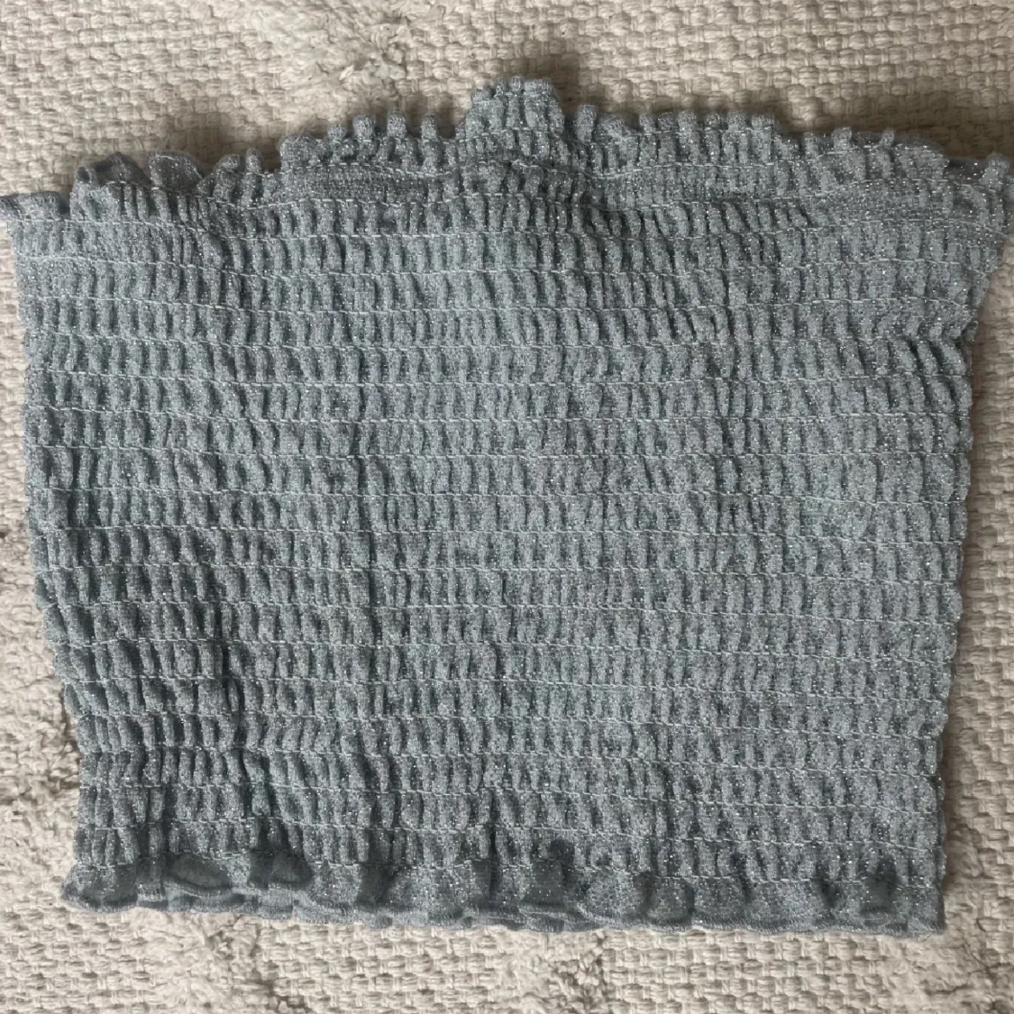 Ljusblå glitter bandeu topp