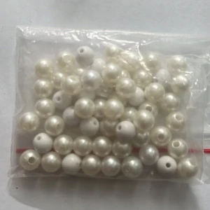 Pärlor  - Pärlor vita/ beacha  Virka 50 stycken 