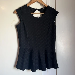 Peplumtopp - Helt ny