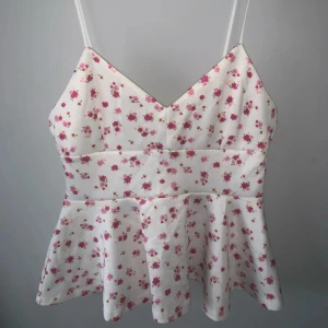 Blommig peplum topp - Använd fåtal gånger