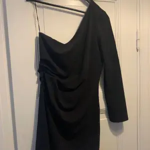 Black one-shoulder dress from H&M. Worn once so in great condition. 