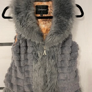 Snygg väst - Stl l men passar xs/s Som ny