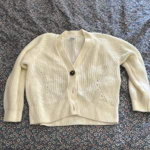 Kids awhite cardigan but fits S size adult as a crop cardigan. Used but in very good condition no defects.