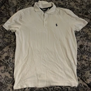 Ralph lauren pike vit - Vit polo Ralph lauren pike, väldigt bra skick