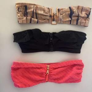 Tre bikini överdelar, alla är köpt på H&M. Den svarta och rosa är stl 36 och den mönstrade är stl 38.