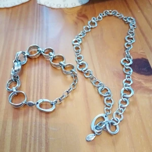 Set halsband och armband stål.Fossil. - Set halsband och armband stål.märke Fossil i nyskick.