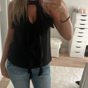 Topp - Helt oanvänd topp med prislapp kvart nypris 400