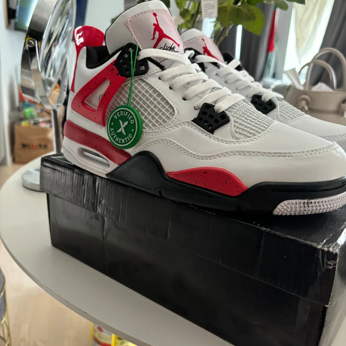 Jordan 4 red cement