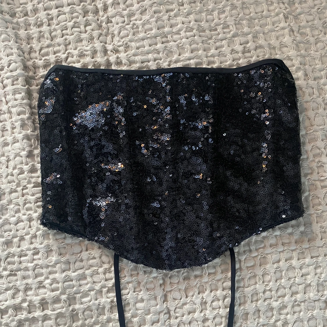 Korsetttopp med paljetter