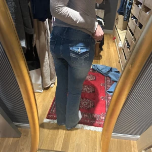 Jeans - Lågmidjade bootcut jeans