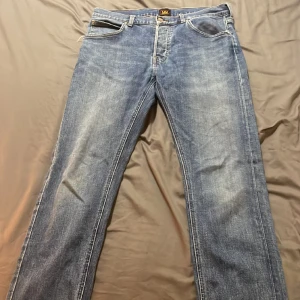 Marinblå jeans - Marinblå Lee Jeans,  W32  L34