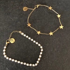 2 fina Guld armband Edblad Sirius & Strass - Guld och vita strass stenar  Mkt fint skick, knappt använda 