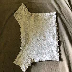 Jättefin topp - En jättefin topp sitter hur fint som helst på! Använd några gånger!