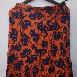 midikjol - sant i storleken, knytning vid midja 