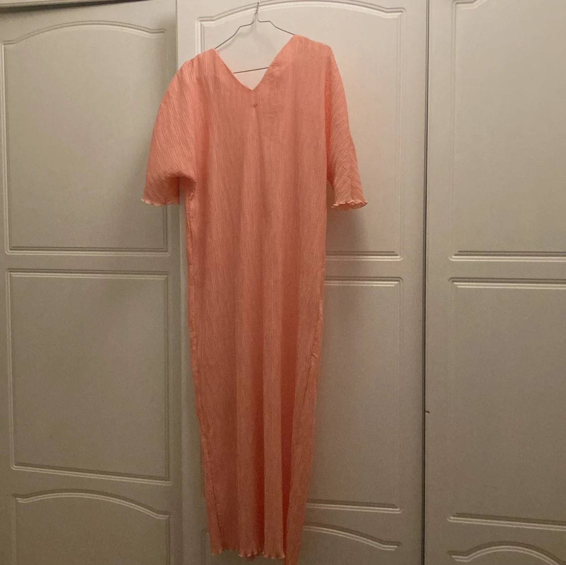 Rosa klänning från Arket, storlek 38