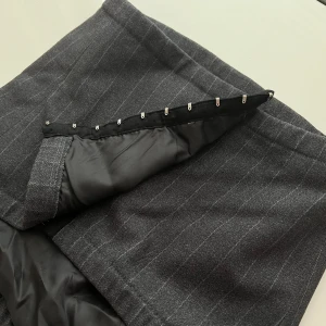 Korsettopp - Perfekt korsettopp från Venderbys. Säljer då jag inte fått använding av den. Grå/svart i färgen.  Exklusive frakt