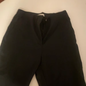 Kostymbyxor - Högmidjade kostymbyxor från h&m