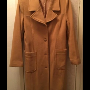 Kappa oanvänd  70% ull - Oanvänd 