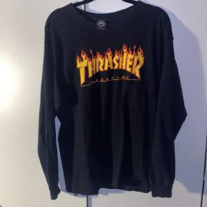 Bra skick svart thrasher long sleeve har varit använd jätta bra för layering eller pa kallare sommar kvällar