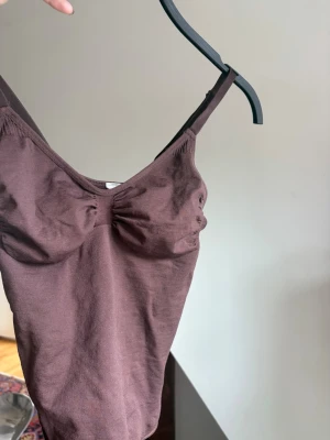 Brun body  - Så snygg body man kan ha på fest💙