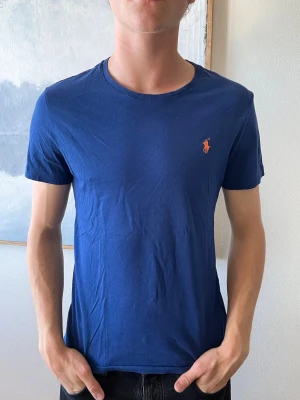 Oanvänd Ralph Lauren t shirt 