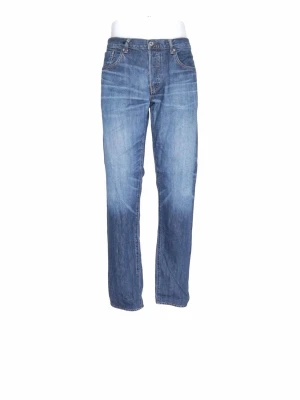 Edwin Jeans - Klassiska blå jeans med rak passform och fem fickor. Jeansen har en snygg tvättad look med ljusare partier framtill och bakfickor med diskreta sömmar. Tillverkade i denim med knappgylf och bälteshällor.