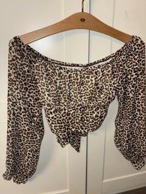 Leopard knyttopp 