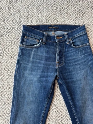 Nudie jeans - Nudie jeans - Modell: Grim Tim - Storlek: W27/L32 - skick: 9/10 - Nypris runt 2000kr