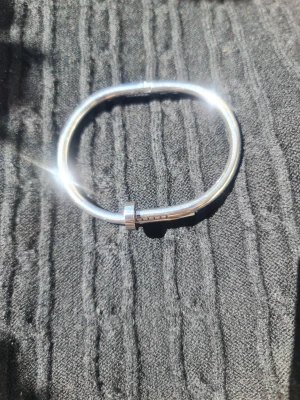 Whitegold armband with nail design  - Whitegold armband with nail design. Minimalistic and chic look.