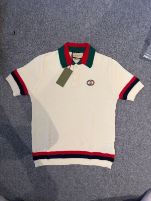 Gusci cream/white polo shirt - Size M, fits 100% true to size. Just like new, never worn. Feel free to ask questions. Yes we ship to sweden and other countries too.