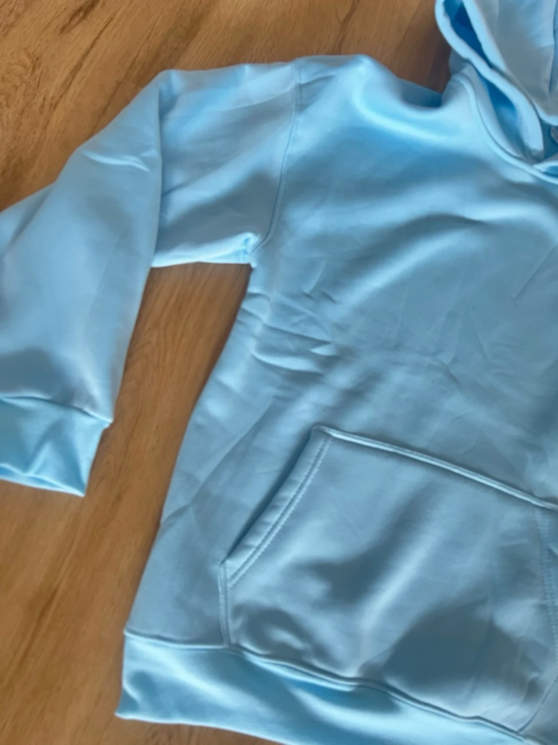 Ljusblå hoodie med magficka - 1