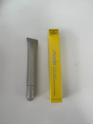 Rhode Peptide Lip Tint Passionfruit - Rhode passionfrukt lipptint. SKAL INGÅR EJ