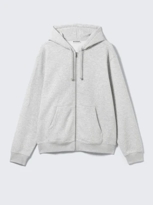 Grå hoodie från Weekday - Säljer en stilren grå hoodie från Weekday med dragkedja och huva. Perfekt för en avslappnad look. Den har långa ärmar och är tillverkad i mjukt material för extra komfort. Tror storleken är herr M