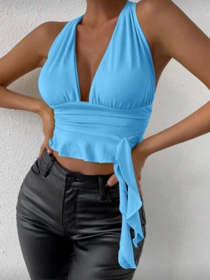 Ny topp - Aldrig använd, i nyskick. Säljer även en likadan i rött 