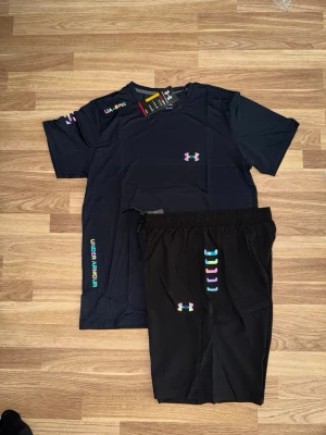 svart under armour set stl L passar M - stl L passar M
