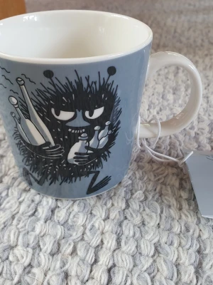 Ny Muminmugg Stinky Mumin  - Utgången felfri mugg med etikett kvar. Packar mycket bra. 