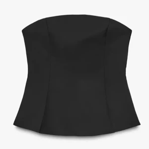 Svart axelbandslös korsettopp - Snygg svart korsettopp med axelbandslös design och figurnära passform. Storlek S med prislapp då den endast är testad och var tyvärr för liten för mig.