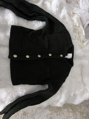 Kofta/topp - Grön kofta med fina knappar 