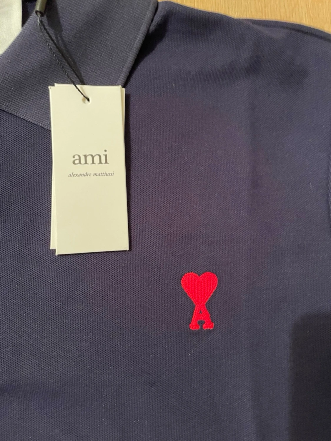 Mörkblå piké från Ami Paris - 2