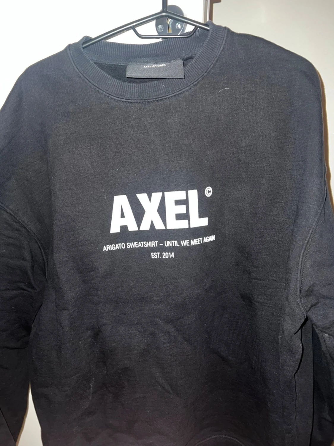 Svart sweatshirt från Axel Arigato - 1