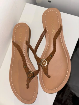 GUESS Brown Sandals - GUESS brown sandals in a good condition. Prices are negotiable!
