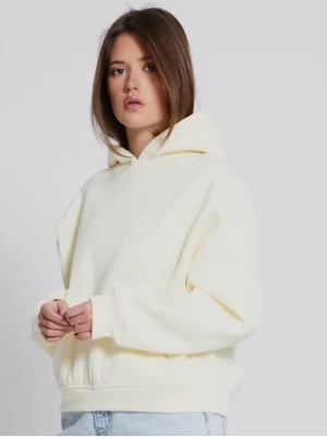 Oversize ljusgul hoodie - Säljer en oversize hoodie i ljusgul färg med huva och ribbade muddar. Hoodien har en klassisk passform och är tillverkad i mjukt material, perfekt för en avslappnad look. Passar dig som gillar enkel och clean stil.