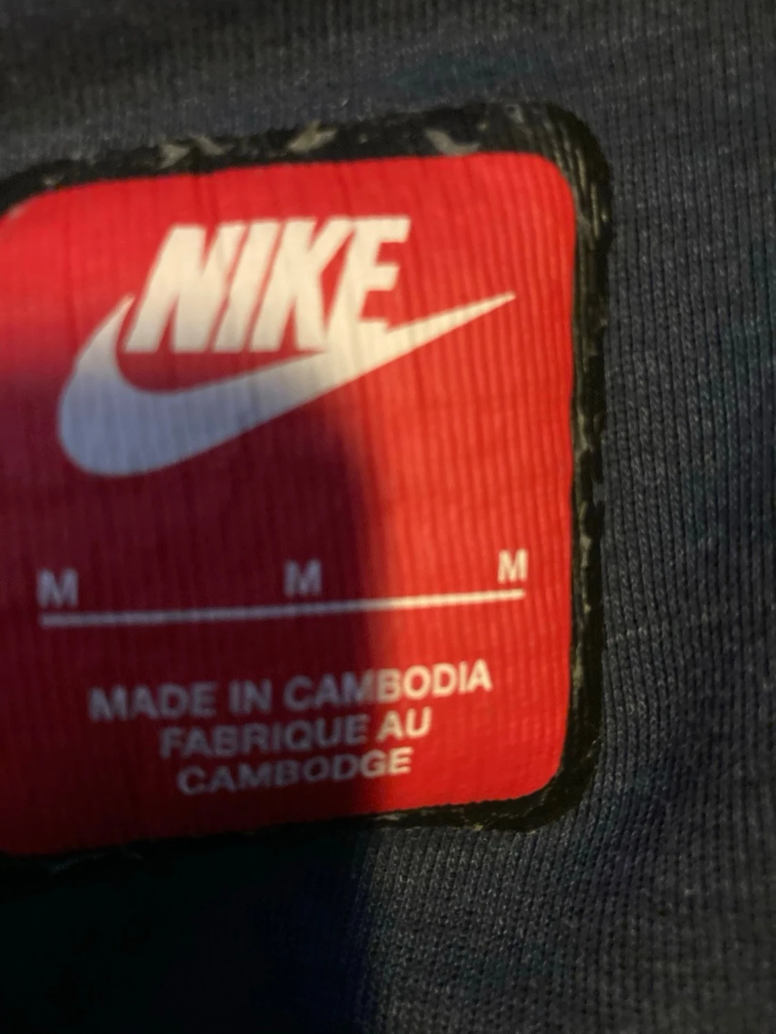 Mörkblå hoodie från Nike med dragkedja - 1