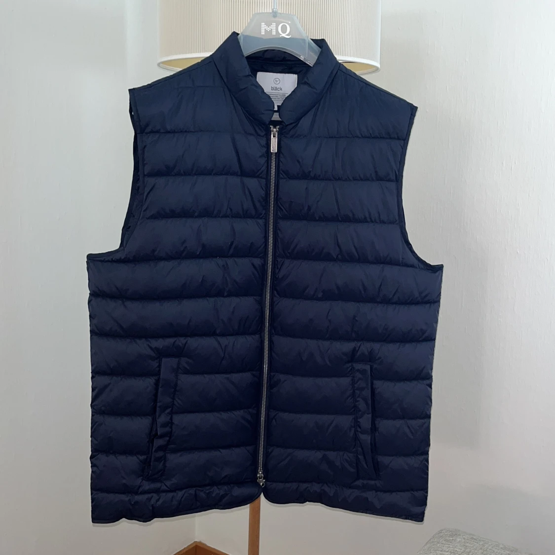 Mörkblå dunväst från Bläck XL