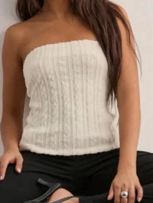 Topp från Nelly - Säljer den här tube toppen från Nelly. Storlek xs 